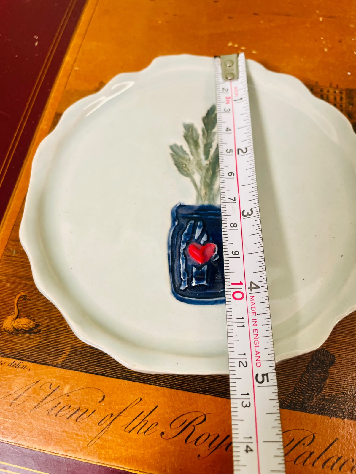 Hand-Painted Scalloped Ceramic Trinket Dish with Blue Jar & Red Heart – 12cm