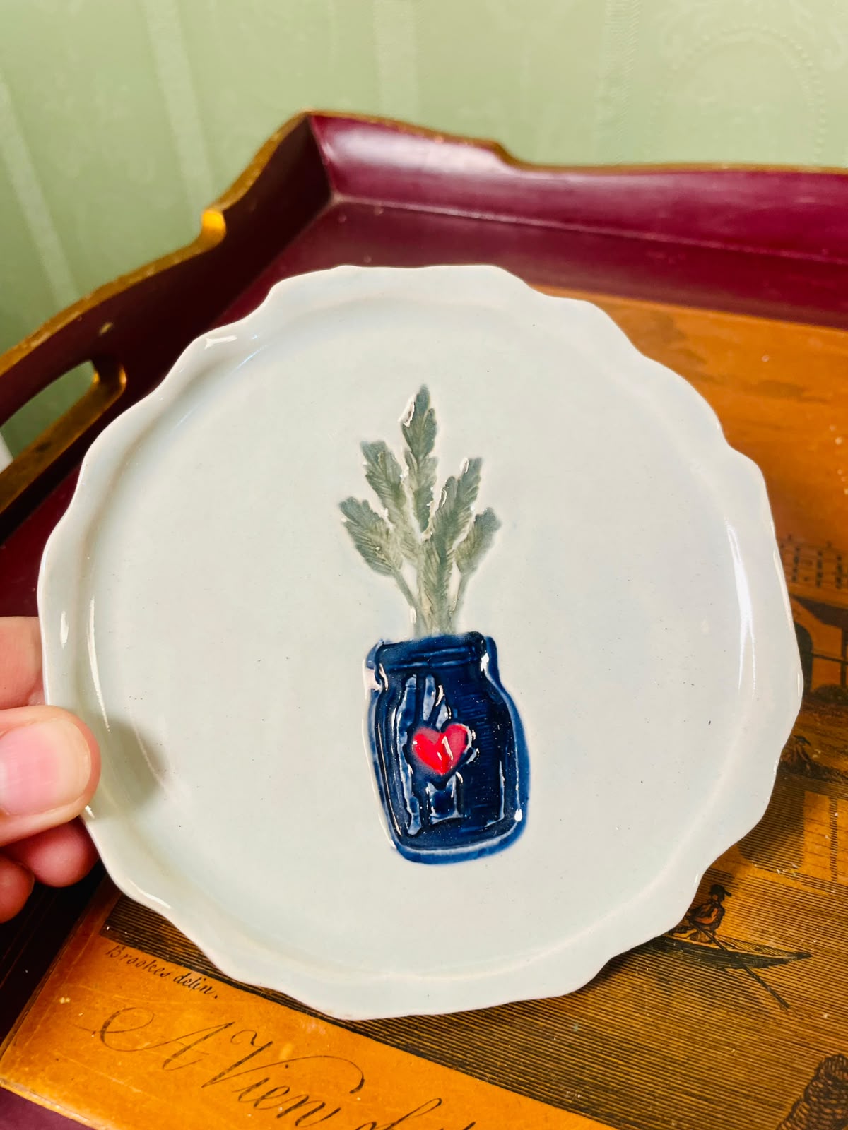 Hand-Painted Scalloped Ceramic Trinket Dish with Blue Jar & Red Heart – 12cm