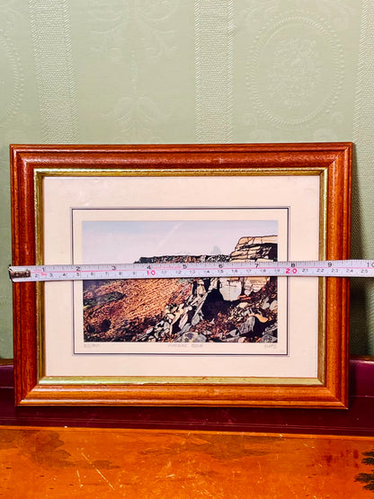 Framed Coastal Cliff Art Painting in Brown Frame Approx. 9.5 inch