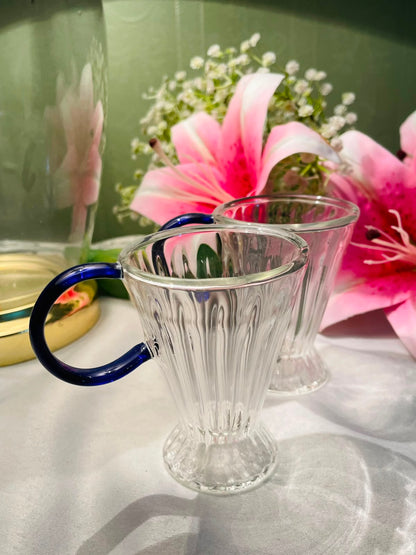 Set of 2 Clear Glass Mugs Blue Handles 9 cm