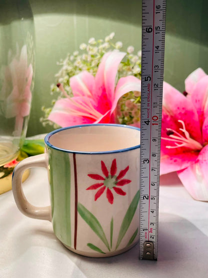 Hand painted Green & Red Floral Ceramic Mug Blue Rim 9 cm