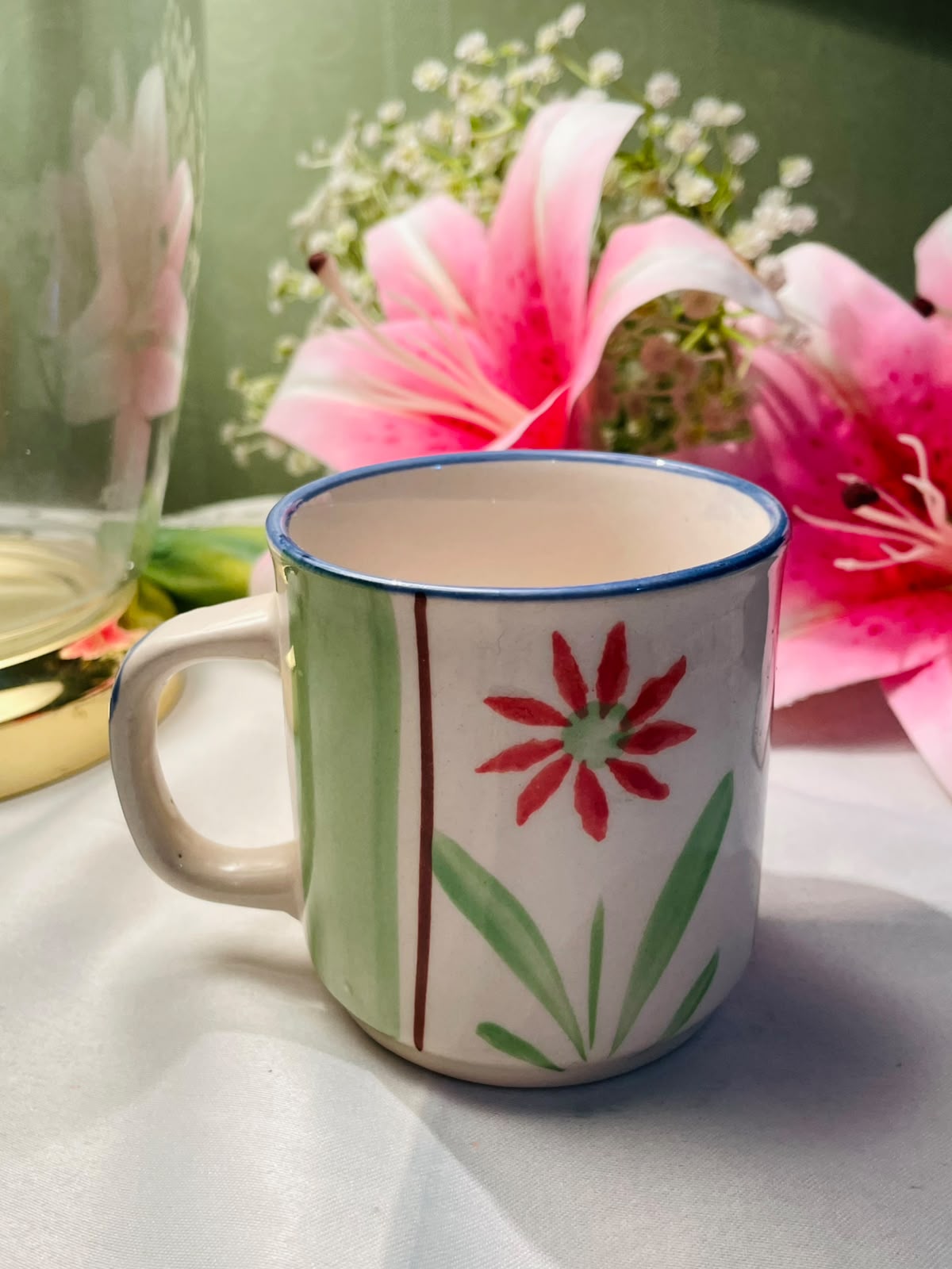 Hand painted Green & Red Floral Ceramic Mug Blue Rim 9 cm