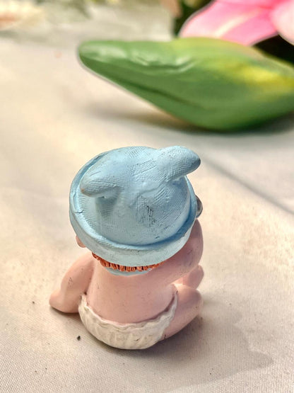 Baby with Rattle Miniature Figurine Blue Hat 6cm