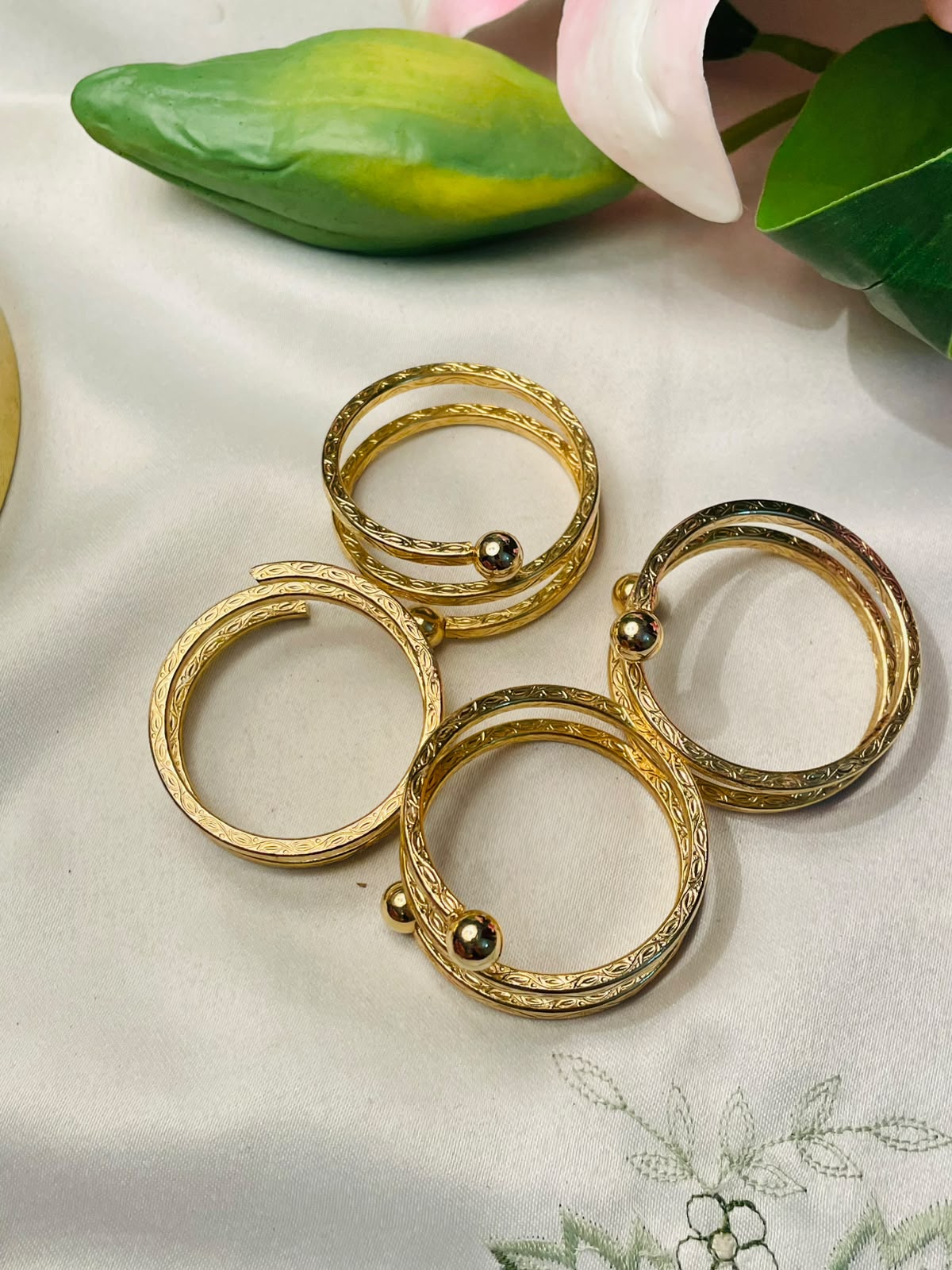 4-Piece Gold-Tone Spiral Napkin Ring Set