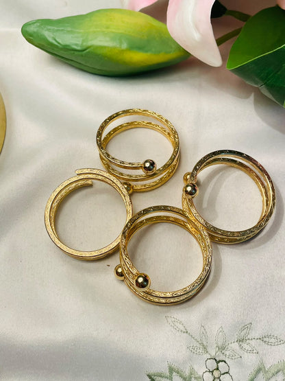 4-Piece Gold-Tone Spiral Napkin Ring Set