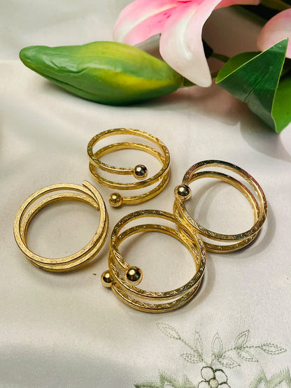 4-Piece Gold-Tone Spiral Napkin Ring Set