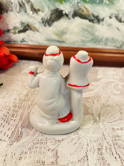Vintage Porcelain Tailor Lady Figurine