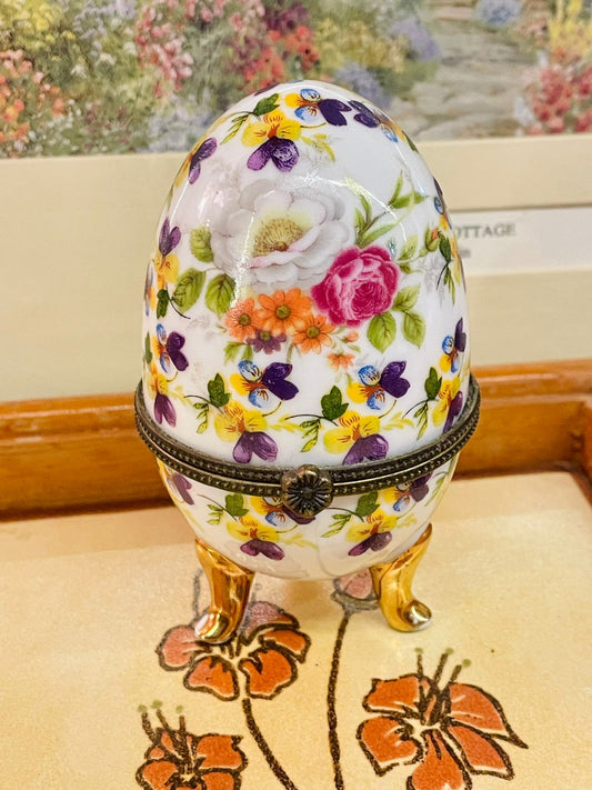 porcelain trinket egg, floral egg box, vintage trinket box, collectible porcelain egg, gold trim egg, cottagecore decor, floral jewellery box, decorative egg ornament, vintage vanity decor, gift for collectors, shabby chic home decor