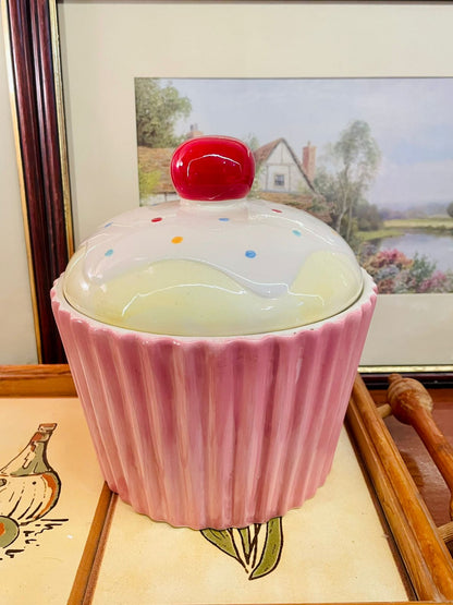 cupcake jar, cookie jar ceramic, candy storage jar, pastel kitchen decor, cute kitchen accessories, creative tops collectible, pink home decor, cupcake storage container, cherry cookie jar, dessert table decor