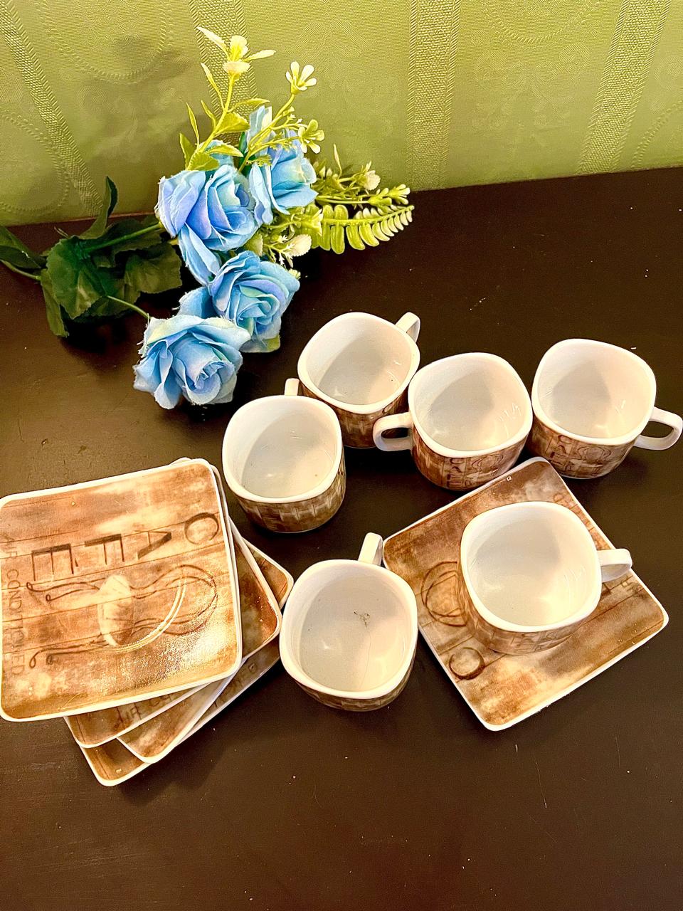 Vintage CAFE ceramic cup and saucer set, six pieces stacked