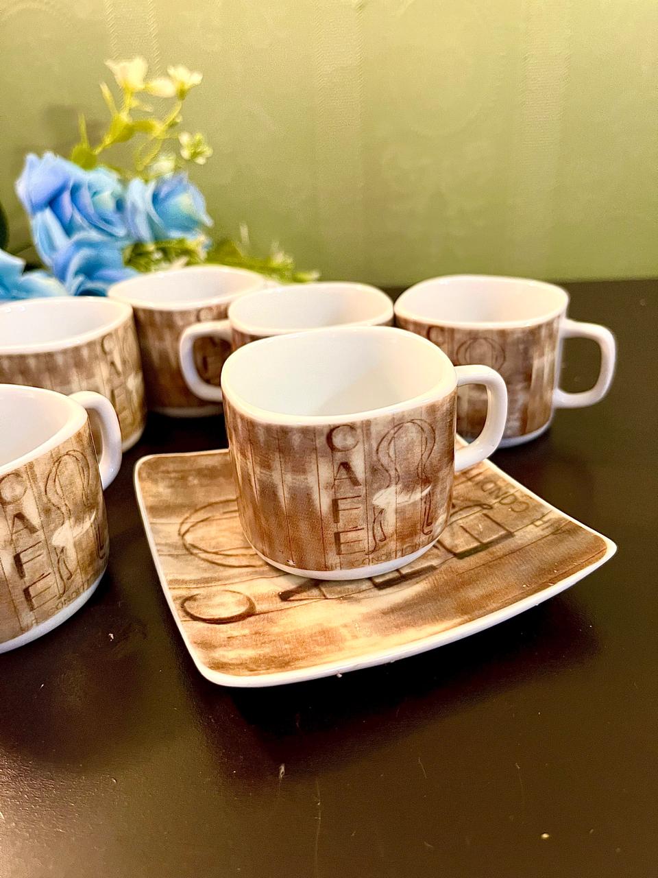 Close up of CAFE cup and saucer sepia print