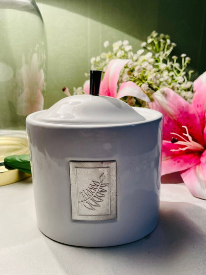 White Ceramic Lidded Storage Canister with Decorative Plaque
