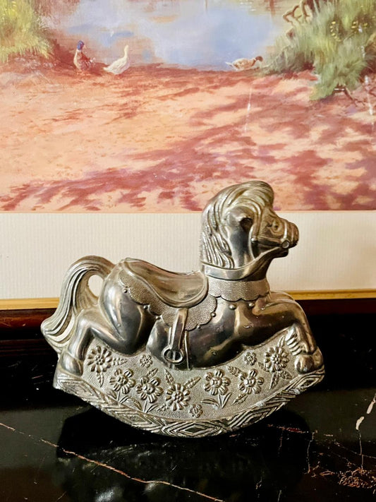 rare thrift finds, vintage silver rocking horse, antique metal horse décor, silver collectible figurine, decorative rocking horse Pakistan, vintage nursery décor, English heritage collectibles, European vintage drop, curated vintage collection, timeless vintage décor