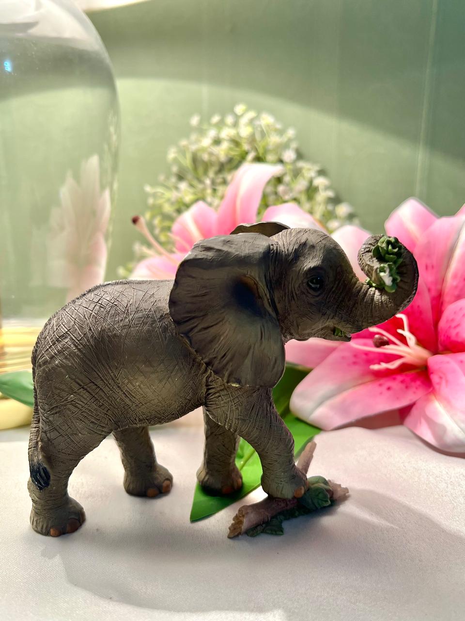 Elephant Figurine with Raised Trunk & Floral Detail – 12 cm