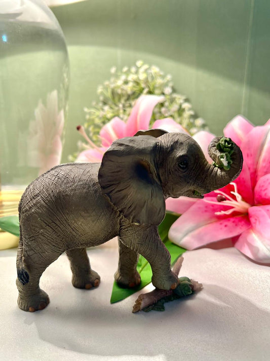 Elephant Figurine with Raised Trunk & Floral Detail – 12 cm