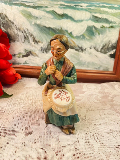 Vintage Elderly Woman Sewing Figurine