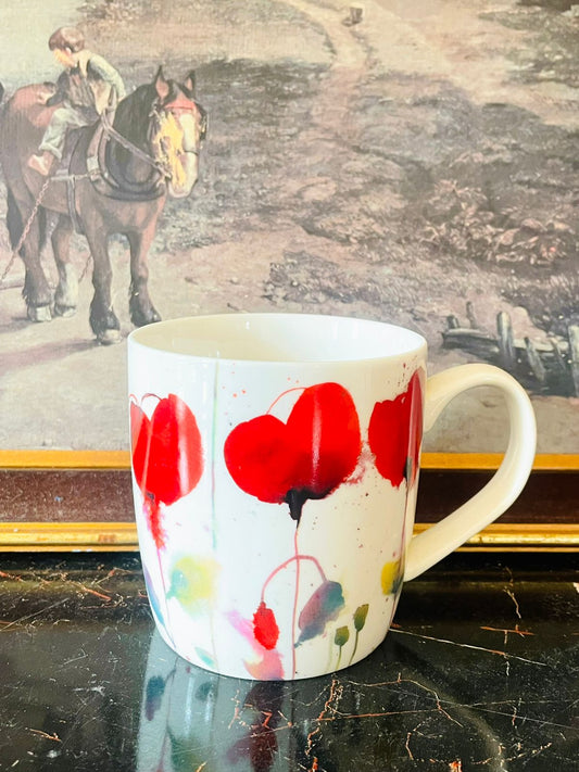 sainsburys mug, watercolour hearts mug, poppy print mug, red heart mug, abstract art mug, modern english mug, ceramic tea mug england, dishwasher safe mug, microwave safe mug, collectible sainsburys crockery, artistic floral mug, english coffee mug, colourful mugs pakistan, everyday tea mug, romantic heart mug