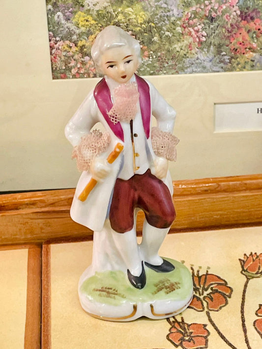 rococo figurine, gentleman statue, porcelain vintage decor, aristocratic home decor, lace trim figurine, ceramic collectible, victorian figurine, classical shelf decor, european style ornament, home display figurine