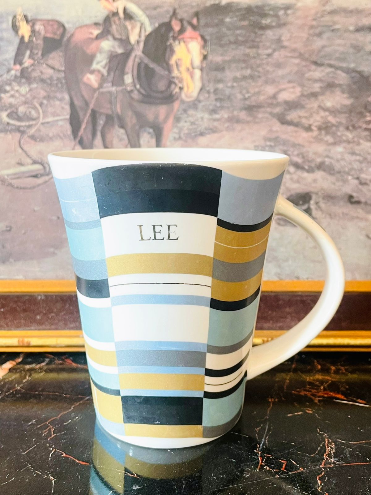 history & heraldry mug, h&h bone china mug, modern british mug, geometric pattern mug, designer tea mug, new bone china cup, collectible english mug, stripe mug england, modern home crockery, minimal style mug, blue and gold mug, high end mug pakistan, sunset kitchen vintage, contemporary mug design