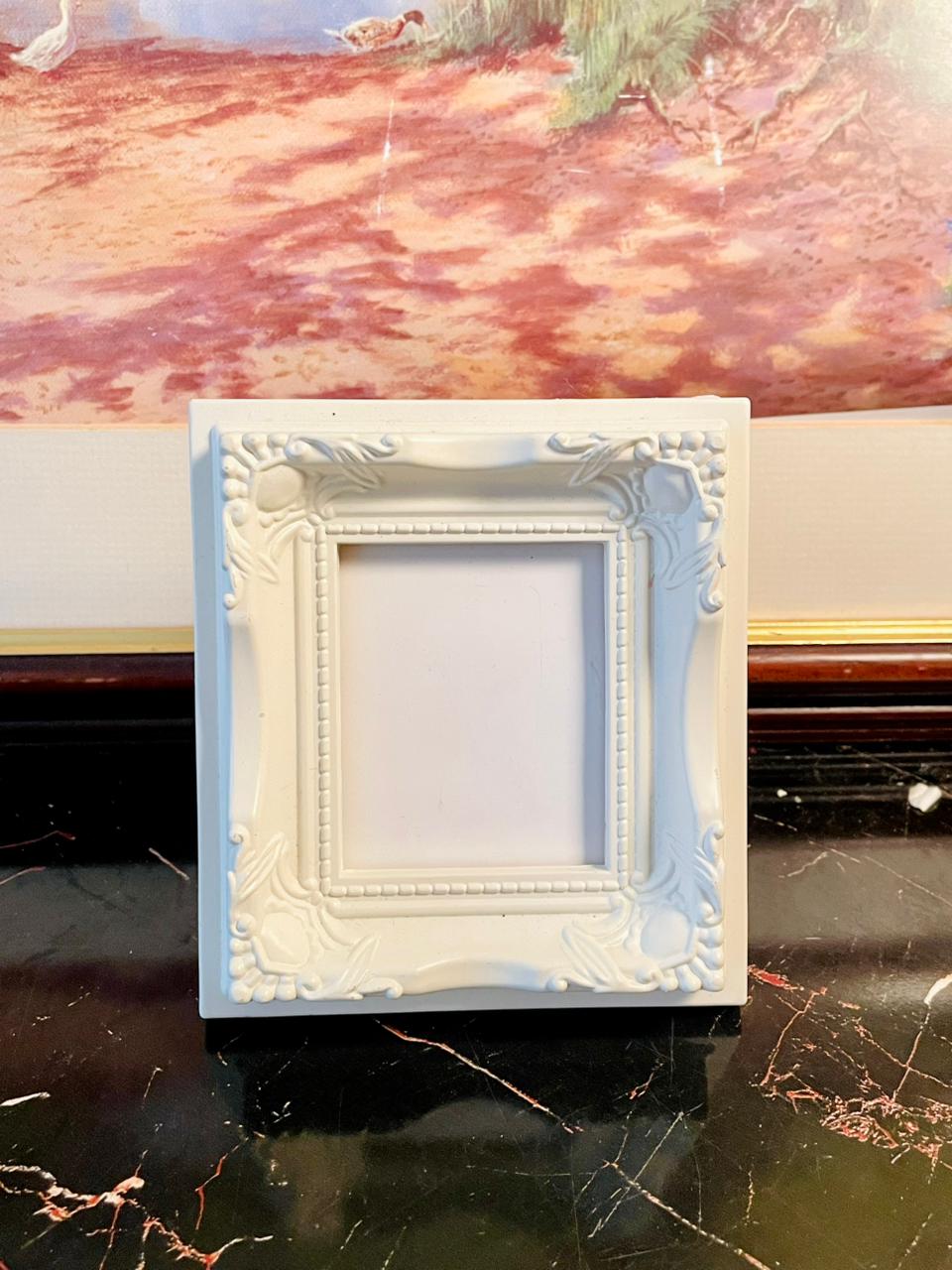 mini vintage photo frame, ornate white picture frame, baroque style décor, small table photo frame, rare thrift finds Pakistan, collectible home décor England, antique inspired photo frame, shabby chic frame, heritage European style décor, timeless vintage accents