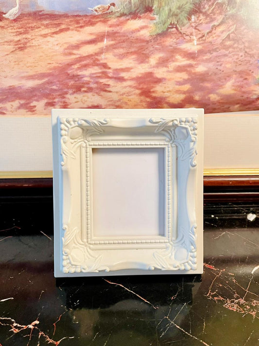 mini vintage photo frame, ornate white picture frame, baroque style décor, small table photo frame, rare thrift finds Pakistan, collectible home décor England, antique inspired photo frame, shabby chic frame, heritage European style décor, timeless vintage accents