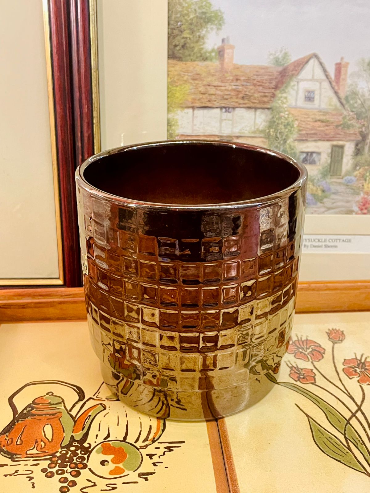 metallic planter, bronze planter, ceramic pot, textured planter, modern home decor, indoor plant pot, geometric pot, brown ceramic planter, reflective planter, stylish plant pot