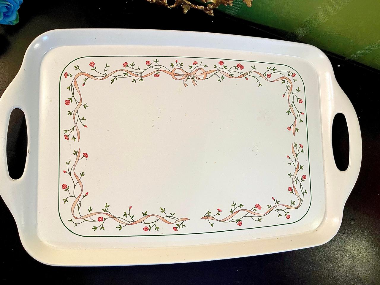 White serving tray with pink ribbon and rosebud border print, cut-out handles