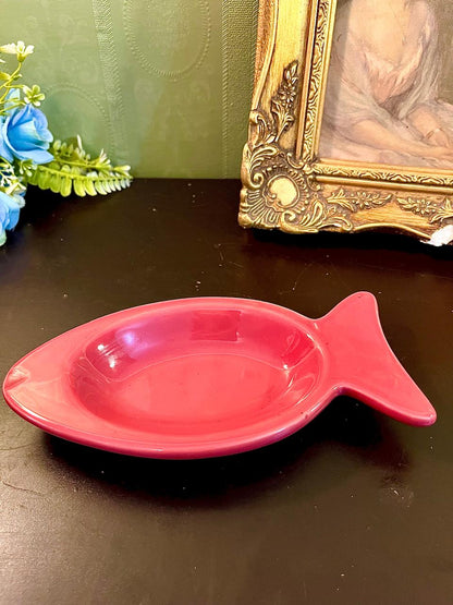 Vintage pink ceramic fish-shaped dish, top view