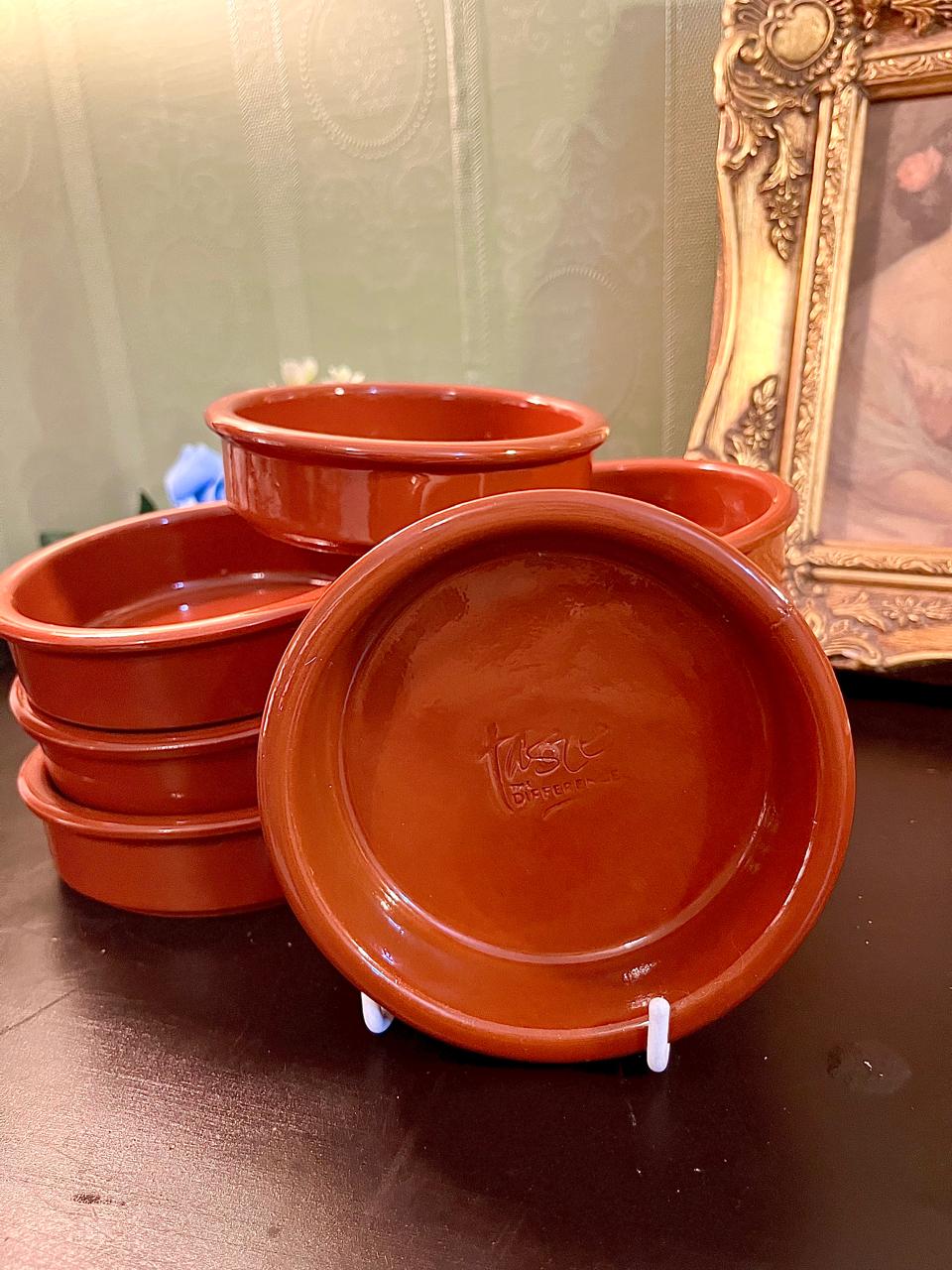 Vintage terracotta bowls set, grouped view showing glazed interior