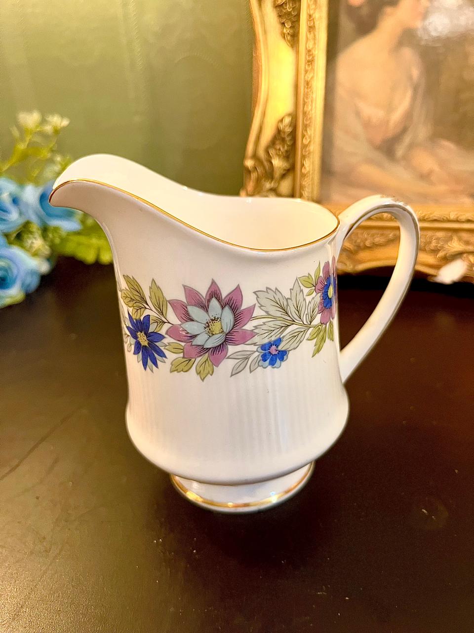 Vintage floral chintz bone china creamer, front view
