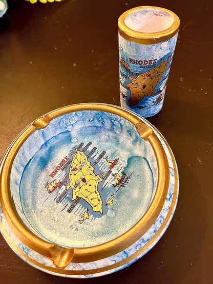 Close-up of vintage souvenir ashtray gold rim and cigarette rests