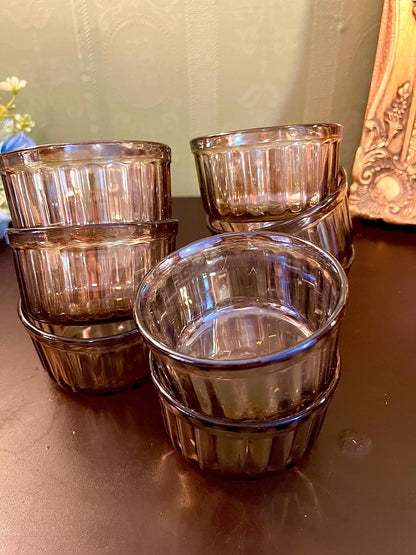 Set of vintage smoky ribbed glass tumblers, grouped view