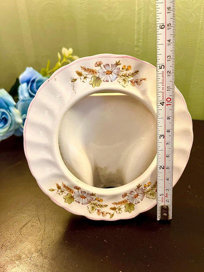 Vintage round ceramic trinket dish with ruler showing approximate 4 inch diameter