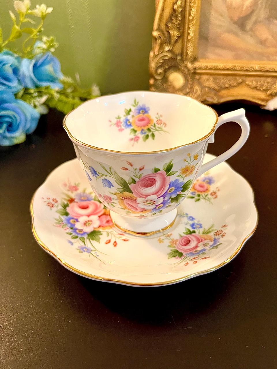 Royal Albert English Bouquet bone china teacup and saucer with pink floral pattern