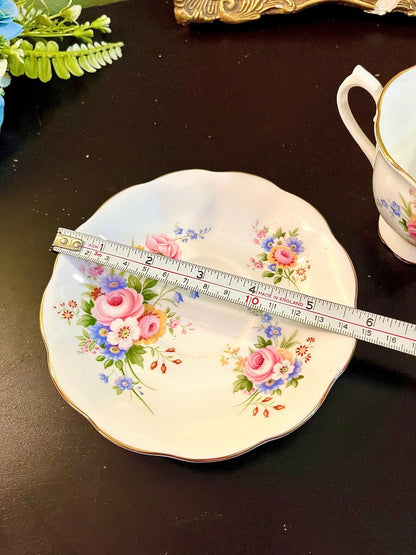 Royal Albert saucer with ruler showing approximately 5.5 inch diameter