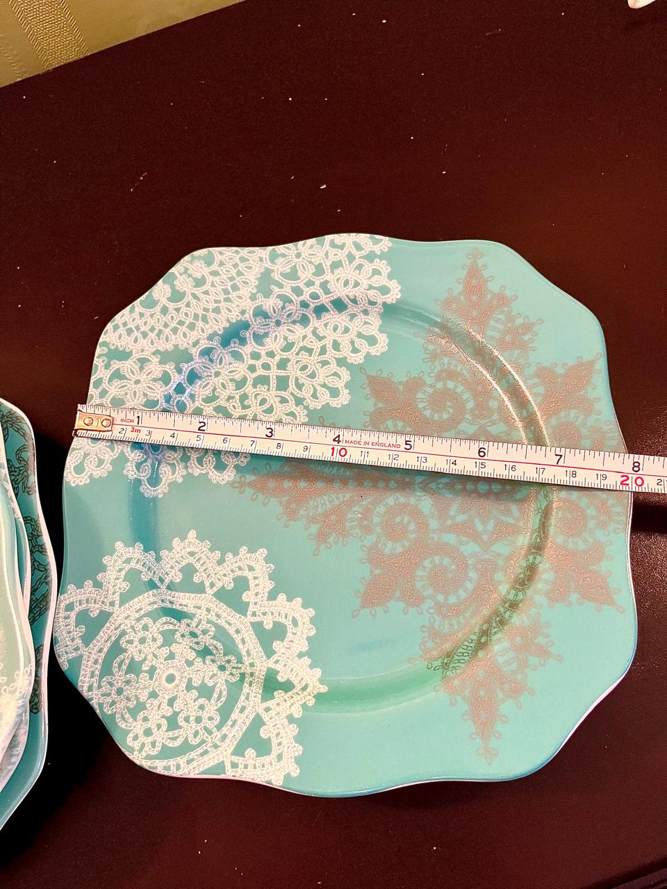Turquoise lace plate with ruler showing approximately 8 inch width