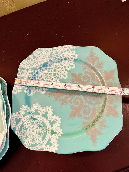 Turquoise lace plate with ruler showing approximately 8 inch width